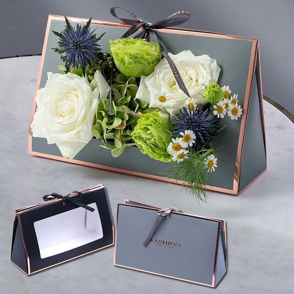 solid color triangular prism flower packaging box paper folding with hollow window wedding party decoration supplies gift wrap
solid color triangular prism flower packaging box paper folding with hollow window wedding party decoration supplies gift wrap