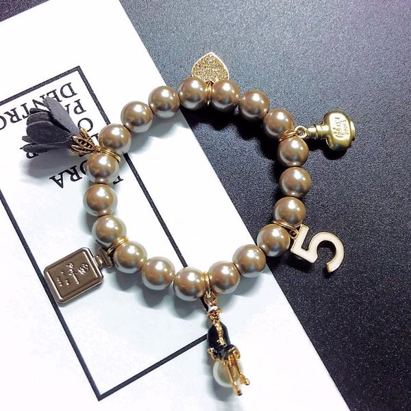 charm bracelets styel bracelet elastic pearl beaded with crystal love flower and lady firgure letter trendy jewelry, Golden;silver
charm bracelets styel bracelet elastic pearl beaded with crystal love flower and lady firgure letter trendy jewelry, Golden;silver