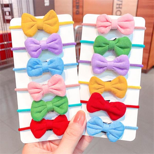 1pair spring summer solid color bow with elastic hair bands kids accessories bowknot tie girls ring rope, Slivery;white
1pair spring summer solid color bow with elastic hair bands kids accessories bowknot tie girls ring rope, Slivery;white