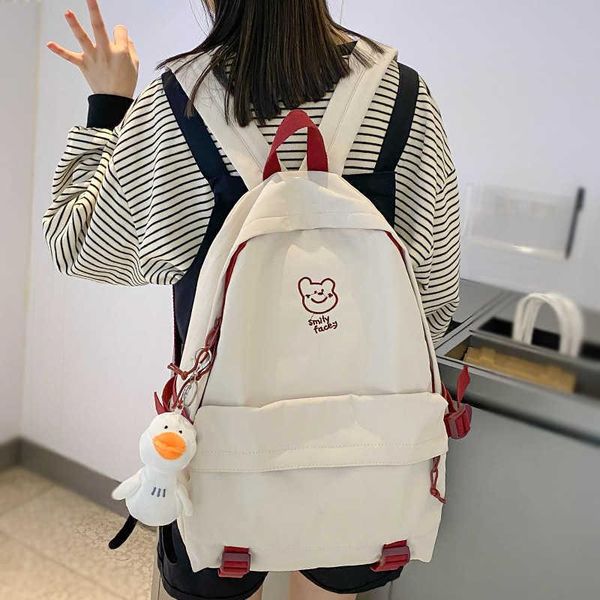 backpack of cartoon embroidered female travel ability korean nylon bag girls simple book buckles
backpack of cartoon embroidered female travel ability korean nylon bag girls simple book buckles