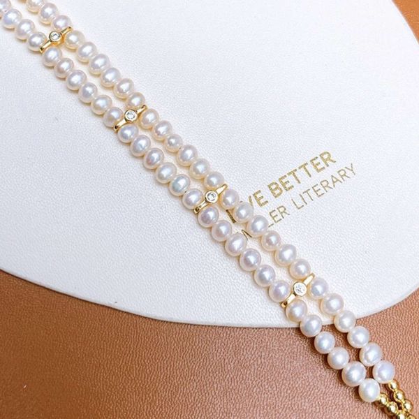 new simple style clover double row bracelet 4-5mm freshwater pearl hand jewelry for women, Black
new simple style clover double row bracelet 4-5mm freshwater pearl hand jewelry for women, Black