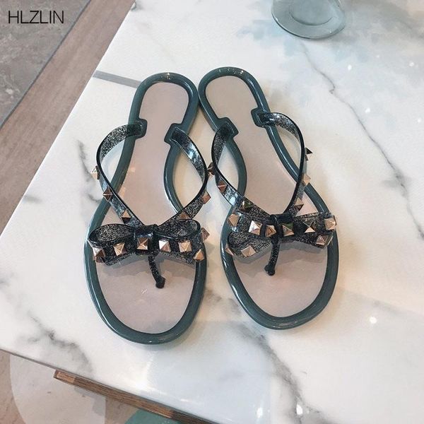 spring and summer plastic women's jelly sandals crystal flat heel rivet flip metal buckle beach shoes slippers, Black
spring and summer plastic women's jelly sandals crystal flat heel rivet flip metal buckle beach shoes slippers, Black
