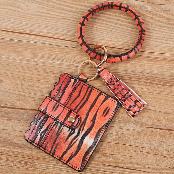 factory wholesale leopard leather tassel bracelet keychain card holder document package coin purse clutch, Silver
factory wholesale leopard leather tassel bracelet keychain card holder document package coin purse clutch, Silver