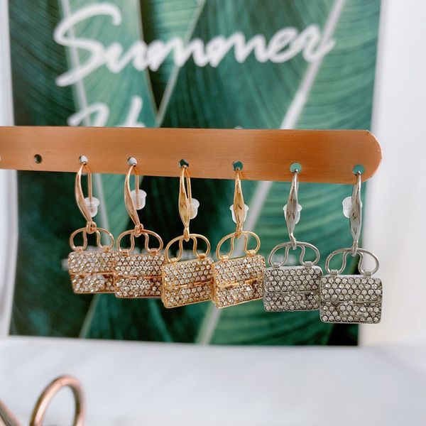 2021 fashion earrings 316l stainless steel luxury women dangle rose gold bags designer earring jewelry gifts, Silver
2021 fashion earrings 316l stainless steel luxury women dangle rose gold bags designer earring jewelry gifts, Silver