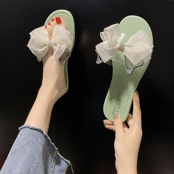 slippers bow knot flat ladies summer transparent pvc sandals women outside fashion sweet soft sole slides shoes 2021, Black 
slippers bow knot flat ladies summer transparent pvc sandals women outside fashion sweet soft sole slides shoes 2021, Black