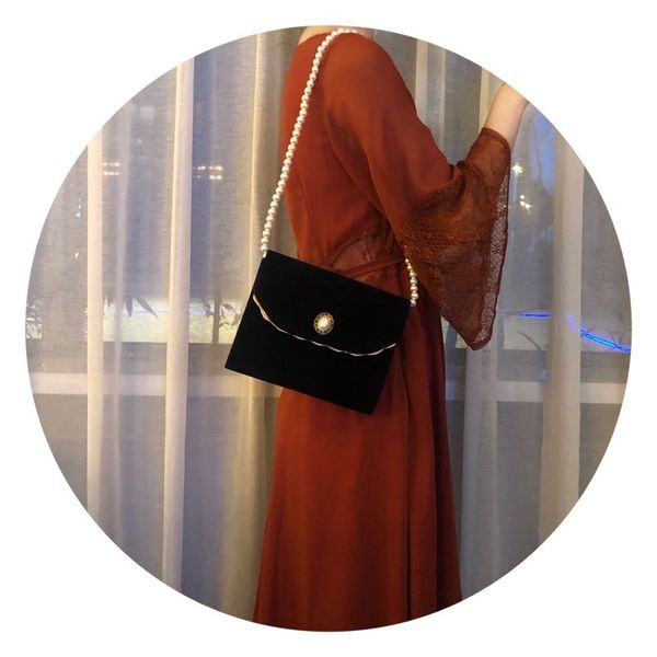 miss cat suede pearl wave phnom penh decorative dinner bag
miss cat suede pearl wave phnom penh decorative dinner bag