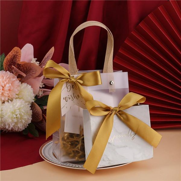 gift wrap 10pcs originality pvc candy box tote bag with packaging wedding favors birthday company party supplie
gift wrap 10pcs originality pvc candy box tote bag with packaging wedding favors birthday company party supplie