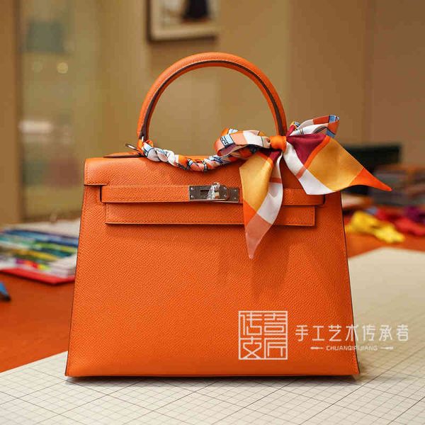 designer handbags 2021 women's herme bag kellys bag epsom leather palm print orange kl25cm gold buckle single shoulder messenger women&
designer handbags 2021 women's herme bag kellys bag epsom leather palm print orange kl25cm gold buckle single shoulder messenger women&