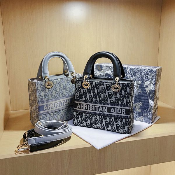 designer spring summer new pu letter printing atmospheric tote bag fashionable simple portable messenger women's bag handbags outlet
designer spring summer new pu letter printing atmospheric tote bag fashionable simple portable messenger women's bag handbags outlet