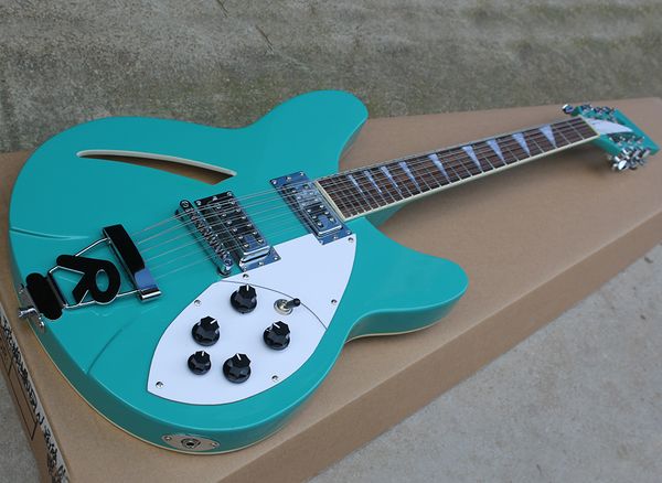 12 strings green-blue semi-hollow electric guitar with r tailpiece,rosewood fretboard,white pickguard
12 strings green-blue semi-hollow electric guitar with r tailpiece,rosewood fretboard,white pickguard