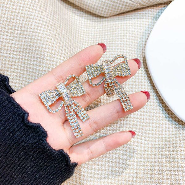 925 silver needle super sparkle zircon long full diamond bow earrings personality fashion earrings
925 silver needle super sparkle zircon long full diamond bow earrings personality fashion earrings