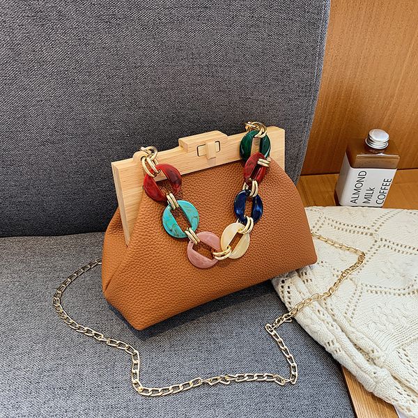 daily bagbrand female chain shoulder bag designer fashion handbags luxury lady wooden handle clip woman purses crossbody bags satchels
daily bagbrand female chain shoulder bag designer fashion handbags luxury lady wooden handle clip woman purses crossbody bags satchels