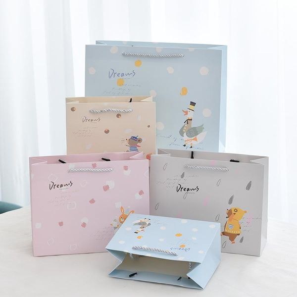 gift wrap cartoon cute puppy handbag children's clothing shopping cardboard bags jewelry store packaging bag kraft paper
gift wrap cartoon cute puppy handbag children's clothing shopping cardboard bags jewelry store packaging bag kraft paper