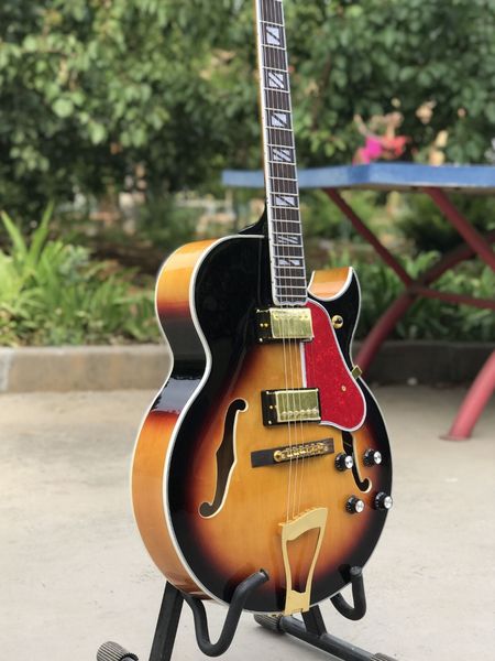 custom hollow body jazz electric guitar mahogany body sunburst color 6 stings gitaar vibrato system
custom hollow body jazz electric guitar mahogany body sunburst color 6 stings gitaar vibrato system