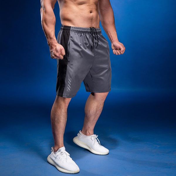gym clothing men's sports shorts fast dry loose style running training leisuree fitness pants, White;black
gym clothing men's sports shorts fast dry loose style running training leisuree fitness pants, White;black