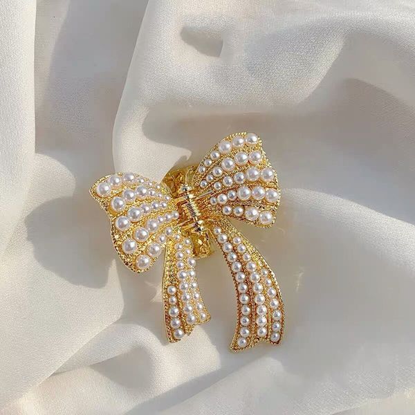 barrettes hairpin korean simple temperament pearl three-dimensional bow grip clip hair back of head ornament pin headdress, Golden;silver
barrettes hairpin korean simple temperament pearl three-dimensional bow grip clip hair back of head ornament pin headdress, Golden;silver