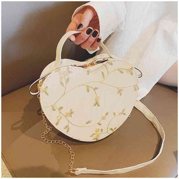 female sweet lace heart round handbags pu leather cross body bags for women small fresh flower chain shoulder bags
female sweet lace heart round handbags pu leather cross body bags for women small fresh flower chain shoulder bags