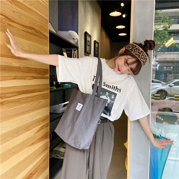 simple reusable women shoulder bag solid color ladies canvas shopping bag large capacity female girl casual tote durable handbag
simple reusable women shoulder bag solid color ladies canvas shopping bag large capacity female girl casual tote durable handbag