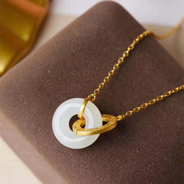 chains silver inlaid natural hetian white jade ring interlocking double pendant necklace light luxury charm women's brand jewelry
chains silver inlaid natural hetian white jade ring interlocking double pendant necklace light luxury charm women's brand jewelry