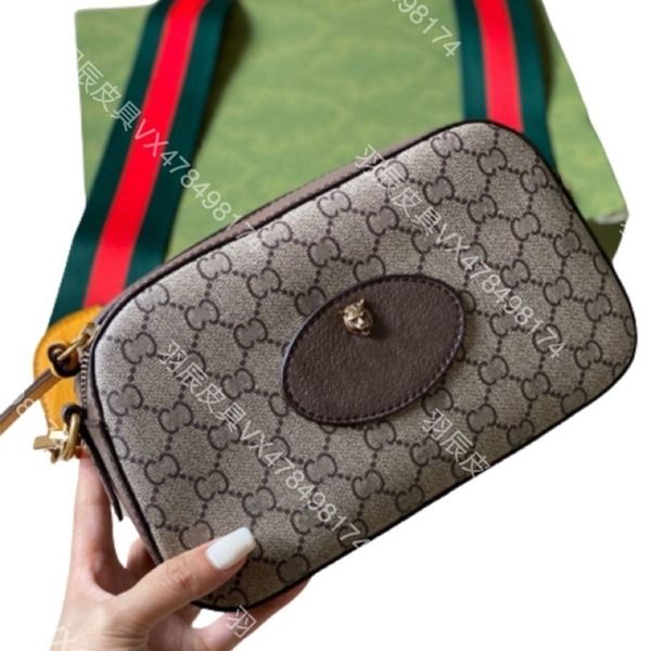 purse 21 new double head camera cowhide printing small square bag same wide shoulder belt single shoulder messenger bag
purse 21 new double head camera cowhide printing small square bag same wide shoulder belt single shoulder messenger bag