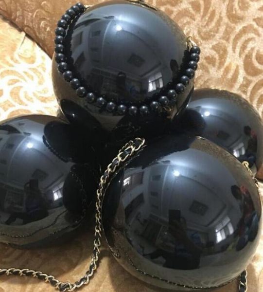 very lovely black white pearl ball clutch wallets women evening bags paris lady handbag
very lovely black white pearl ball clutch wallets women evening bags paris lady handbag