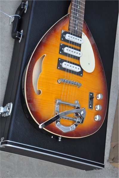brown\wood electric guitar with semi-hollow oval body,sss pickups,maple neck,tremolo bridge
brown\wood electric guitar with semi-hollow oval body,sss pickups,maple neck,tremolo bridge