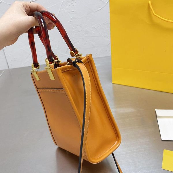 yisykiy famous brand small tote bag women handbag cross body bags plain letter amber handle gold hardware open rivet bottom long shoulder
yisykiy famous brand small tote bag women handbag cross body bags plain letter amber handle gold hardware open rivet bottom long shoulder