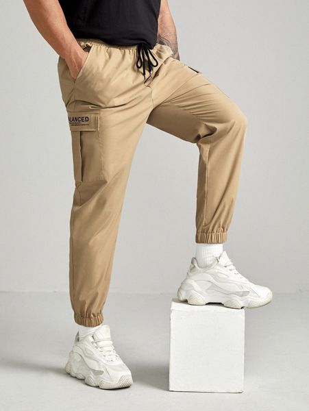 extended sizes men slogan graphic letter patched flap pocket side drawstring cargo pants c1at#, Black
extended sizes men slogan graphic letter patched flap pocket side drawstring cargo pants c1at#, Black
