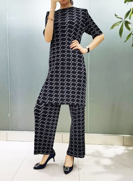 dress miyake fashion fold digital lattice printed half sleeve + loose straight pants suit, Black;gray
dress miyake fashion fold digital lattice printed half sleeve + loose straight pants suit, Black;gray