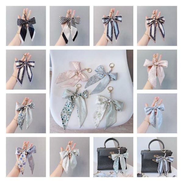 keychains web celebrity bow tie silk scarf creative pearl ribbon key chain lovely bag car decorative pendant lady, Silver
keychains web celebrity bow tie silk scarf creative pearl ribbon key chain lovely bag car decorative pendant lady, Silver