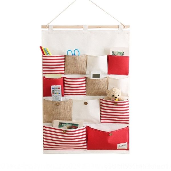 uhse selling cott hemp fabric stripe splicing 13 cotton and linen storage bags on the storage bags wall behind the bathroom door