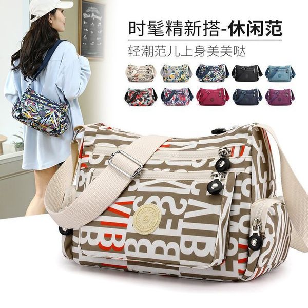 new nylon messenger single shoulder oxford cloth mommy bag canvas leisure fashion women's shopping bag
new nylon messenger single shoulder oxford cloth mommy bag canvas leisure fashion women's shopping bag