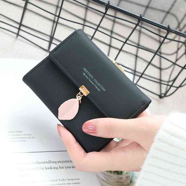 wallet korean solid color pendant clip zero three fold buckle women's short leaf, Red;black
wallet korean solid color pendant clip zero three fold buckle women's short leaf, Red;black