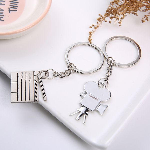 keychains creative lovers making movies keyring car metal men and women keys taobao zengpin, Silver
keychains creative lovers making movies keyring car metal men and women keys taobao zengpin, Silver
