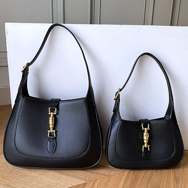 design hand new style underarm in spring and summer 2021 fashionable one shoulder portable horse clasp small square cowhide women's bag
design hand new style underarm in spring and summer 2021 fashionable one shoulder portable horse clasp small square cowhide women's bag