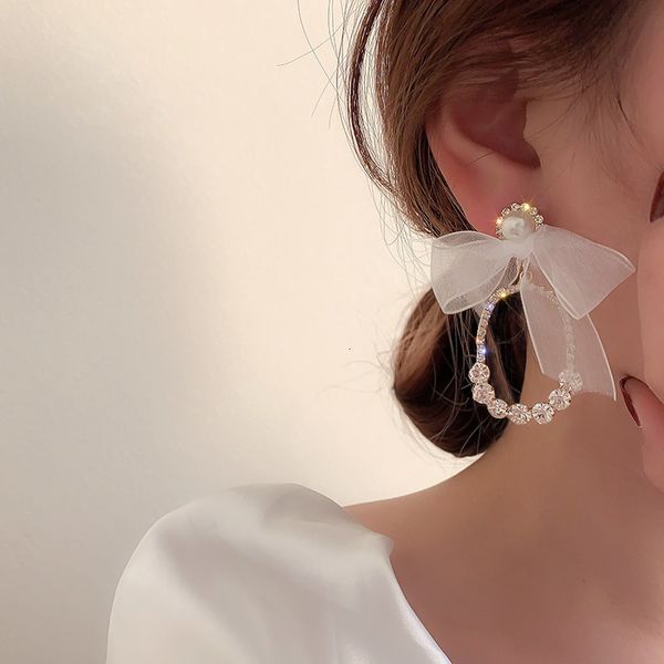 925 silver needle asymmetric diamond inlaid pearl gauze bow chain earrings fashion mori earrings personalized earrings, Golden;silver
925 silver needle asymmetric diamond inlaid pearl gauze bow chain earrings fashion mori earrings personalized earrings, Golden;silver