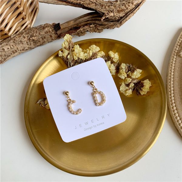 dongdamen same letter millet beads silver needle small commuter popular lady versatile earrings and earrings, Golden;silver
dongdamen same letter millet beads silver needle small commuter popular lady versatile earrings and earrings, Golden;silver