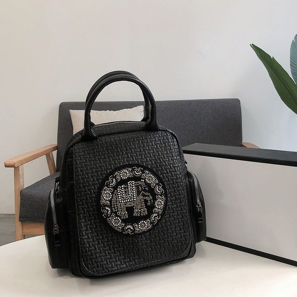 handbag 2021 litchi pattern backpack travel sequin trend black large capacity embroidery bag
handbag 2021 litchi pattern backpack travel sequin trend black large capacity embroidery bag