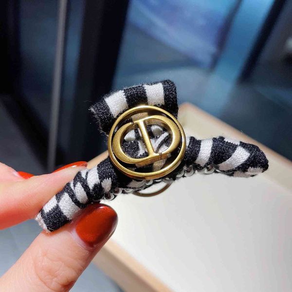hair accessories women's new black and white chessboard grid grab card hair clip brass sub, Golden;silver
hair accessories women's new black and white chessboard grid grab card hair clip brass sub, Golden;silver
