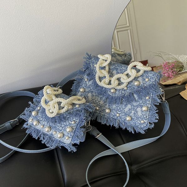 handbag 2021 denim messenger bag heavy industry women's single shoulder tassel fashion korean pearl portable small square
handbag 2021 denim messenger bag heavy industry women's single shoulder tassel fashion korean pearl portable small square