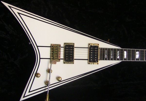 randy rhoads rr 1 black pinstripe white flying v electric guitar gold hardware, block mop inlay, tremolo bridge & whammy bar
randy rhoads rr 1 black pinstripe white flying v electric guitar gold hardware, block mop inlay, tremolo bridge & whammy bar