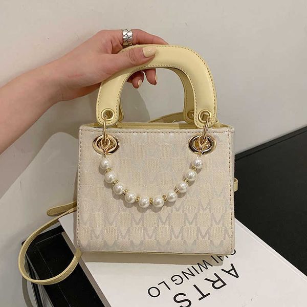 wholesale 2021 letter pearl princess portable one shoulder messenger bag for female students luxuryss designerss yw
wholesale 2021 letter pearl princess portable one shoulder messenger bag for female students luxuryss designerss yw