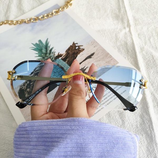 outdoor eyewear 2022 retro rimless oval sunglasses men fashion clear ocean gradient color lens women trending sun glasses shades uv400
outdoor eyewear 2022 retro rimless oval sunglasses men fashion clear ocean gradient color lens women trending sun glasses shades uv400