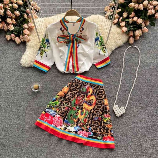 runway design fashion printing suit colorful striped bow tie ruffled shirt and ethnic retro peintted mini pleated skirt 2pcs set 210602, White
runway design fashion printing suit colorful striped bow tie ruffled shirt and ethnic retro peintted mini pleated skirt 2pcs set 210602, White