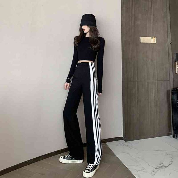 capris Female fall sports jogging wide legged striped high waist sweatpants loose in a straight line fashion leisure pants, Black;white
capris Female fall sports jogging wide legged striped high waist sweatpants loose in a straight line fashion leisure pants, Black;white