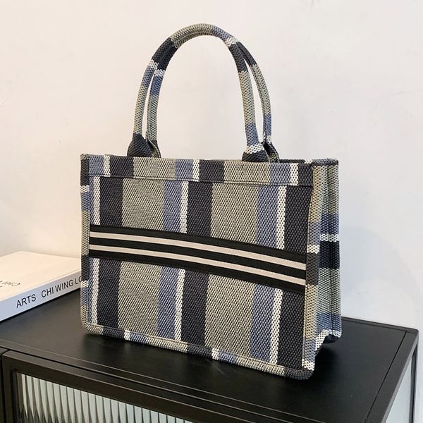 purses large capacity bag women's new fashion contrast stripe portable one shoulder tote bag handbag black friday
purses large capacity bag women's new fashion contrast stripe portable one shoulder tote bag handbag black friday