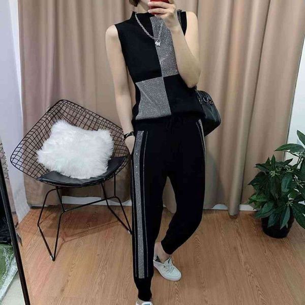 women's two piece pants ensemble of two pieces, summer fashion, sleeveless vest, strass, high waist, casual, knitted or crocheted sweat, White
women's two piece pants ensemble of two pieces, summer fashion, sleeveless vest, strass, high waist, casual, knitted or crocheted sweat, White