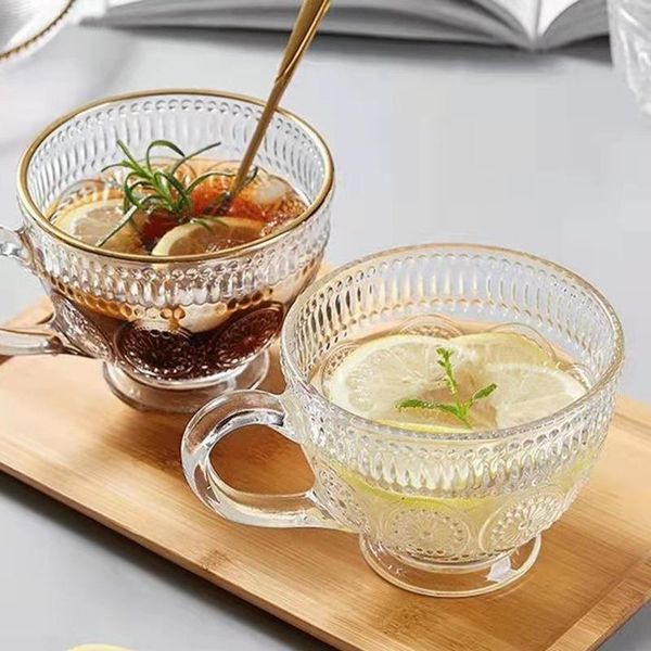 wine glasses breakfast household glass water cup retro embossed sunflower milk with handle printing oatmeal kitchen tools
wine glasses breakfast household glass water cup retro embossed sunflower milk with handle printing oatmeal kitchen tools