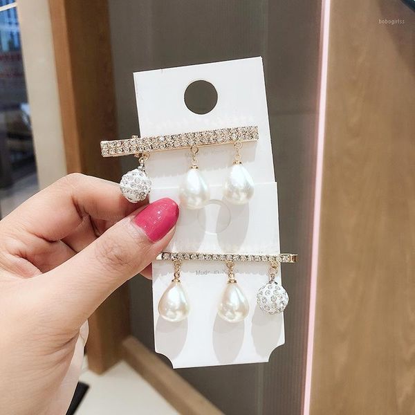 korean sweet girl fashion imitation pearl tassel rhinestones hairpins simple temperament women duckbill clip hair accessories1
korean sweet girl fashion imitation pearl tassel rhinestones hairpins simple temperament women duckbill clip hair accessories1