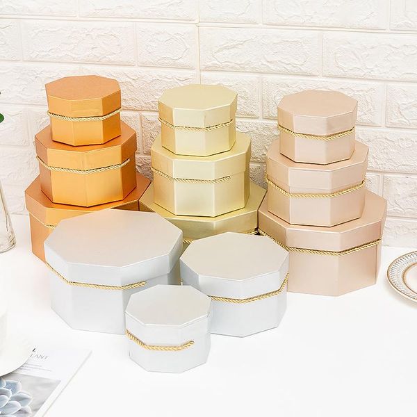 octagon decorative flower paper boxes with lid florist gift packaging handle for wedding party gifts decoratio wrap
octagon decorative flower paper boxes with lid florist gift packaging handle for wedding party gifts decoratio wrap
